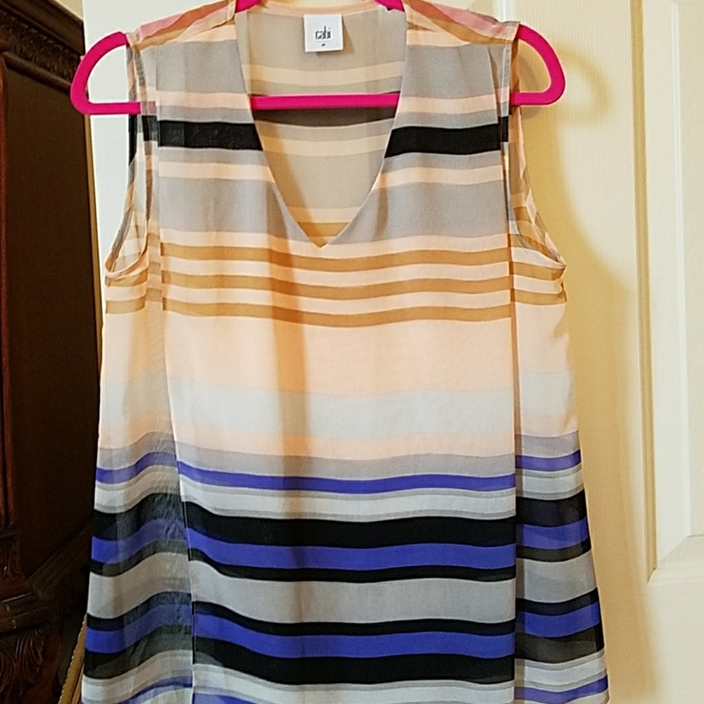 Cabi top size Medium, fits like a Small